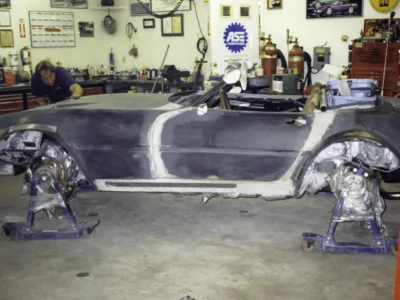 McBurnie Daytona Spyder body on chassis in shop during assembly at Corvette Connection