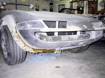 McBurnie Daytona Spyder front nose section showing body filler and primer during body work