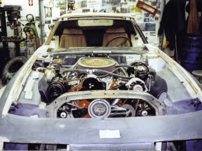 McBurnie Daytona Spyder body on C3 chassis showing engine bay during assembly at Corvette Connection