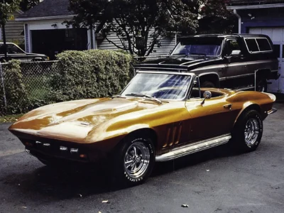 Enhanced original photo of an orange 1965 Chevrolet Corvette convertible photographed outdoors by Corvette Connection in Bolton, Connecticut.