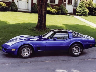 Remastered photo of a blue 1964 Chevrolet Corvette coupe side profile restored by Corvette Connection in Bolton, Connecticut.