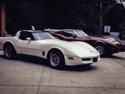 Remastered photo of a white 1984 Chevrolet Corvette coupe photographed outside Corvette Connection in Bolton, Connecticut.