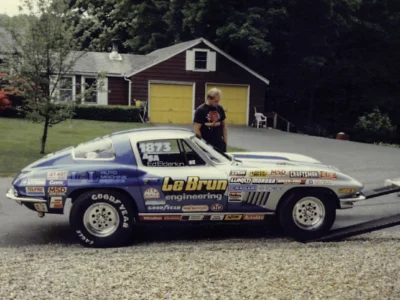 Enhanced original photo of a 1973 Le Brun racing car side view showcased by Corvette Connection in Bolton, Connecticut.