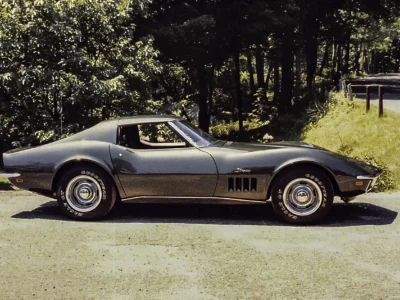 Remastered photo of a silver 1972 Chevrolet Corvette coupe side profile restored by Corvette Connection in Bolton, Connecticut.